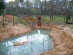 3-7-09 Installing water trough supply pipe.jpg