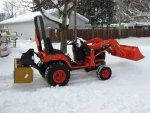 resized_Orange tractor with box blade.jpg